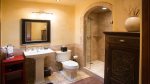 Clean styled bathroom with freestanding vanity